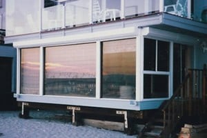 large windows on beachfront home